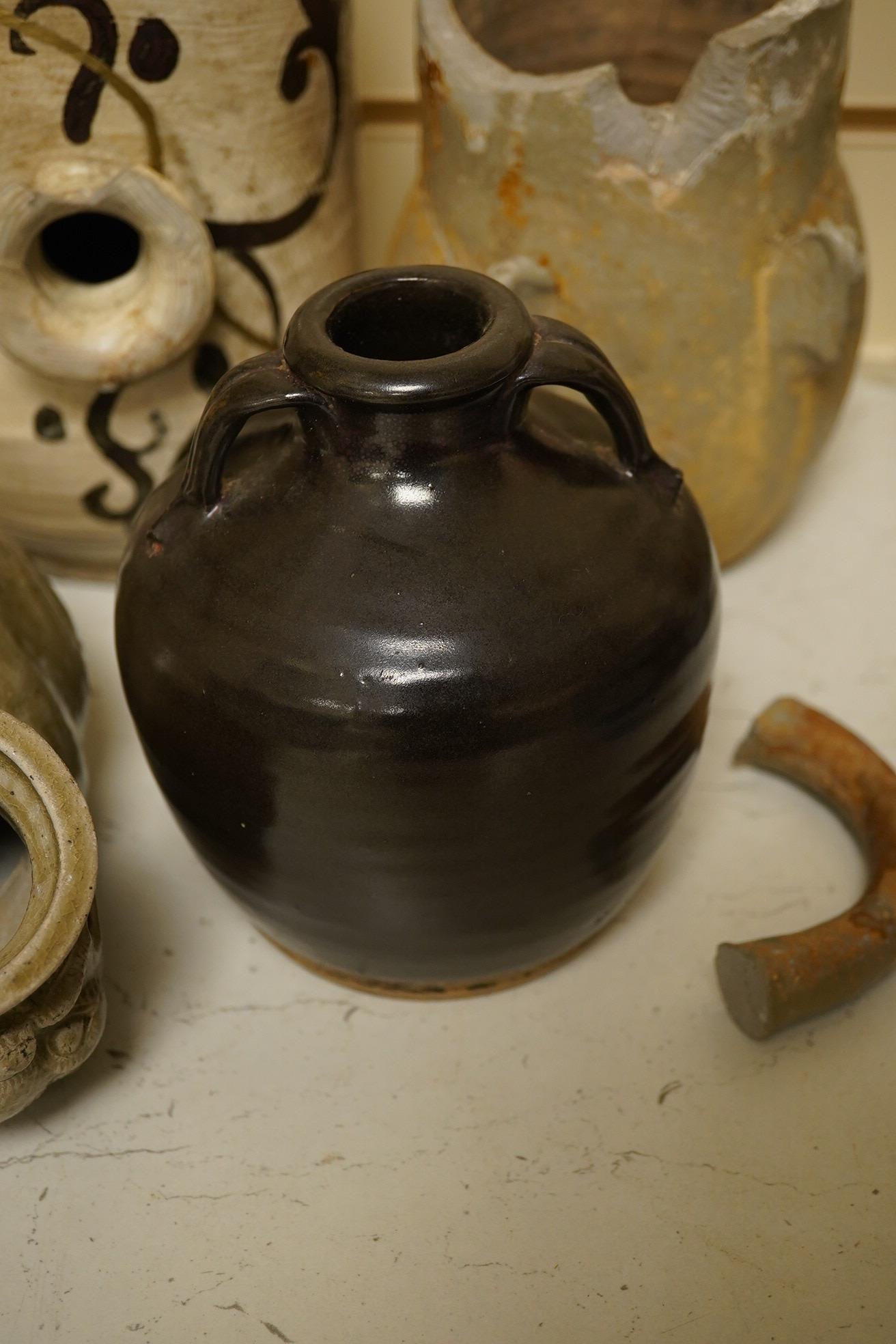 Four various Chinese stoneware vessels, tallest 22cm high. Condition - poor to fair